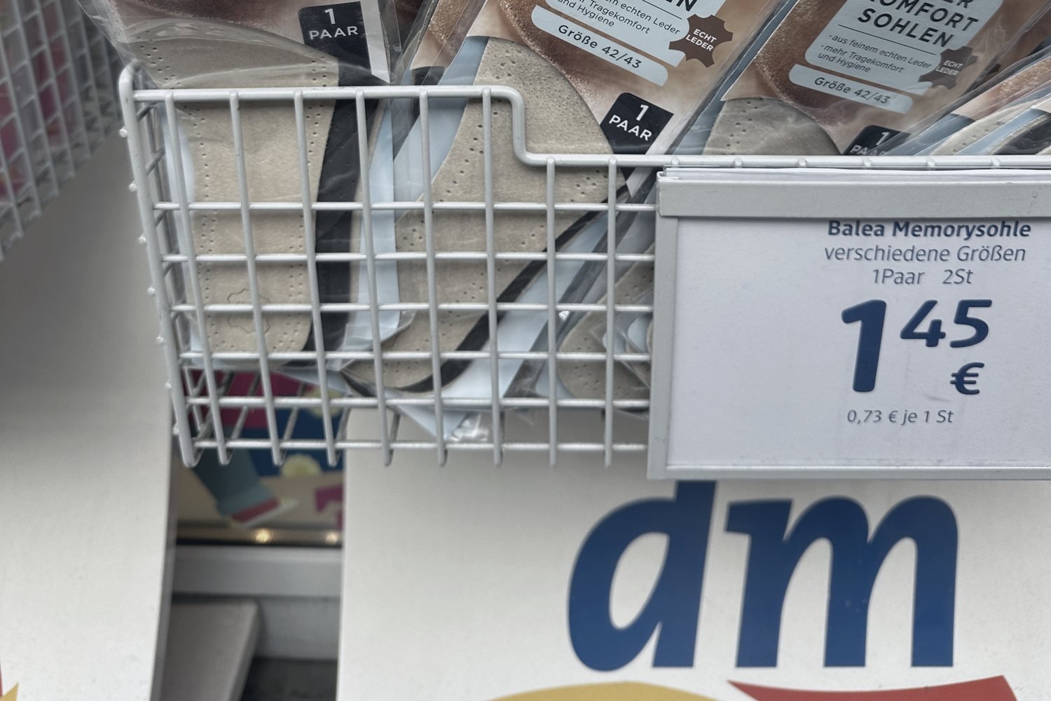 Price tag on a shelf at a dm drugstore in Berlin