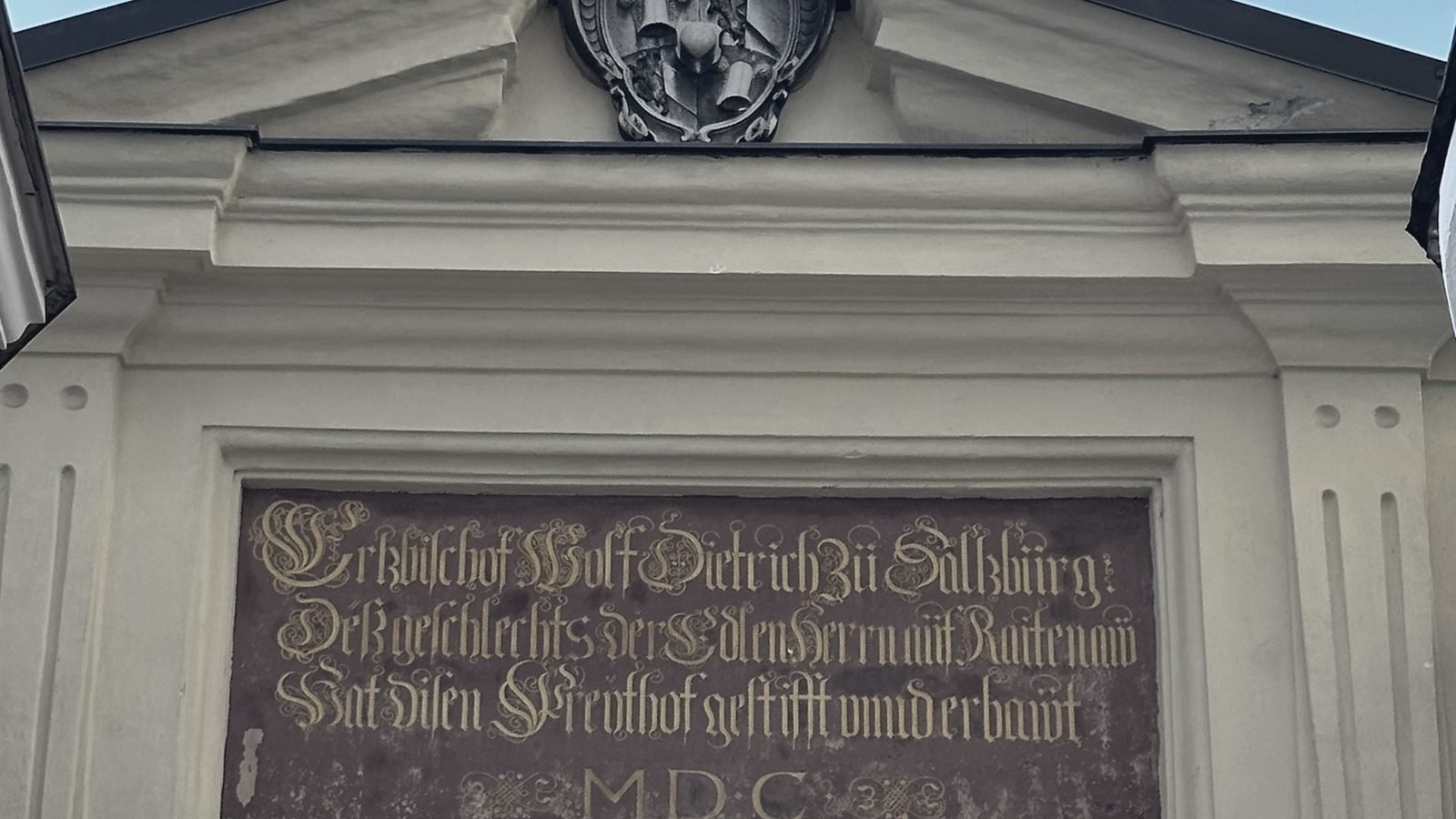 Historic inscription above an entrance in Salzburg, Austria