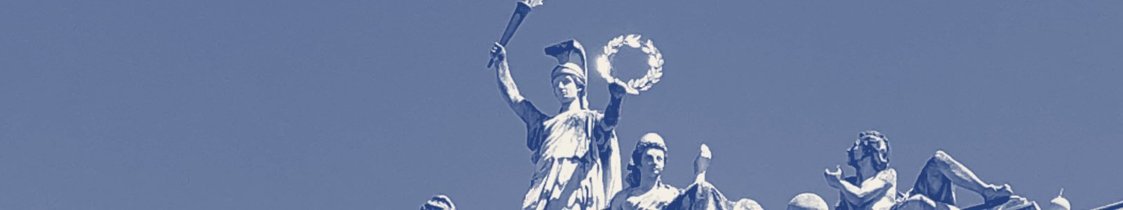 Statues holding a torch and a laurel wreath on the roof of the Palais Universitaire, Strasbourg